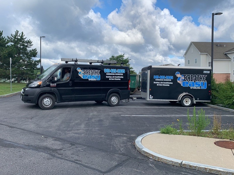 Our service truck pulling the duct cleaning trailer.